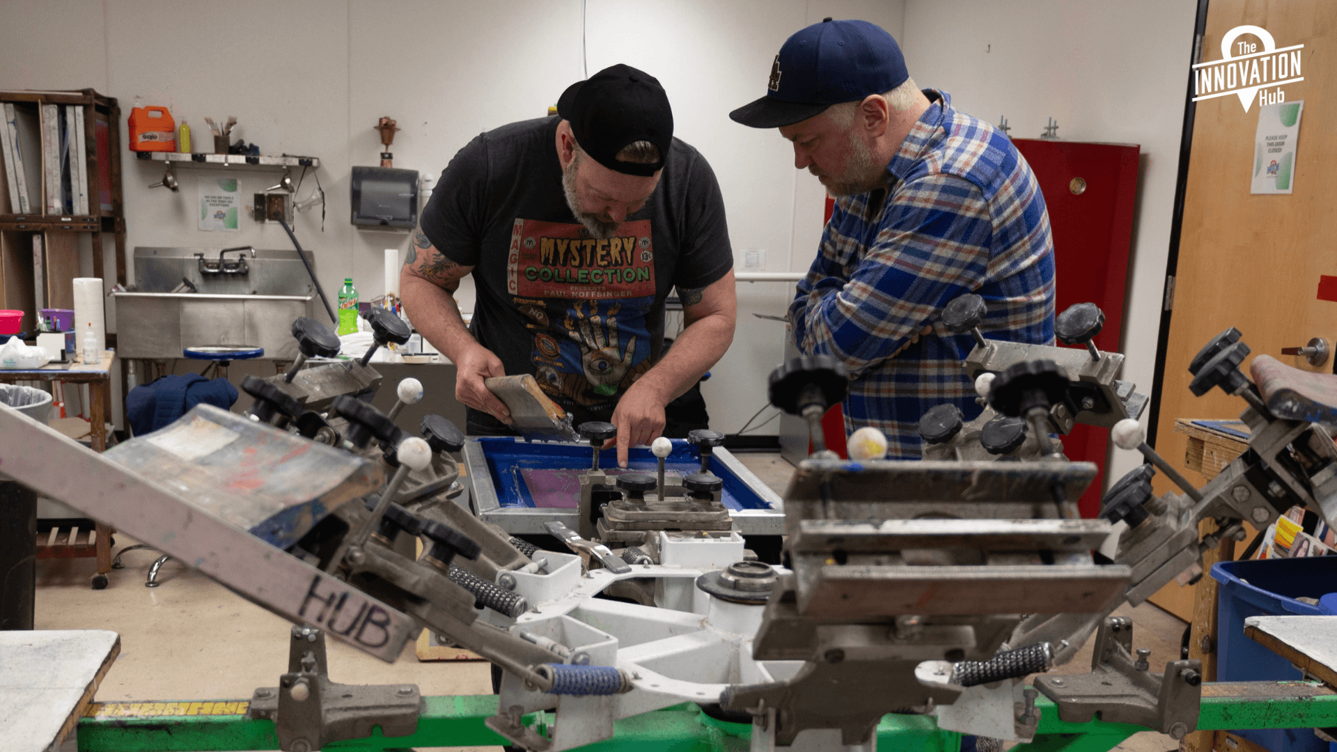 Someone using a pottery wheel and they are shaping a vessel